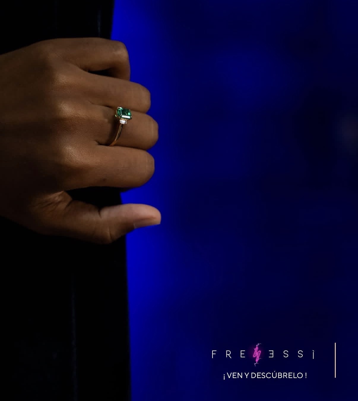 Emerald ring detail — luxury audience